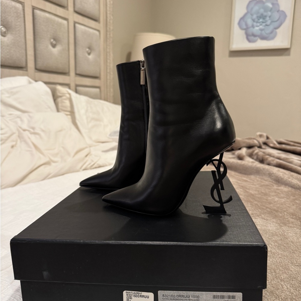 Saint Laurent Sleek Black Heeled Boots with Signature YSL Detail